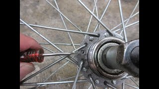 クロスバイク　切れた後輪スポークの交換。　Sports bicycles Broken spokes Replacement